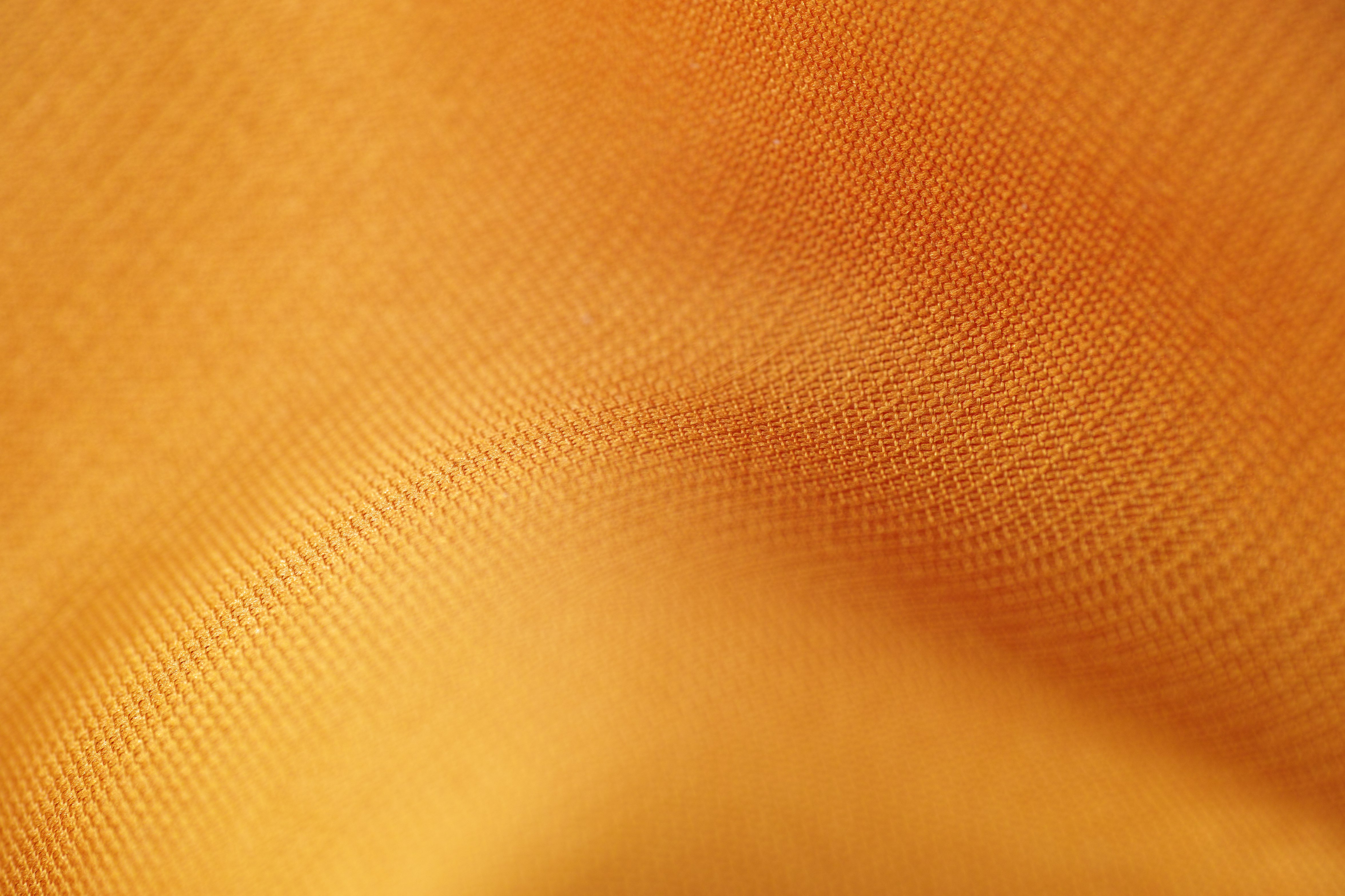 brown textile in close up photography